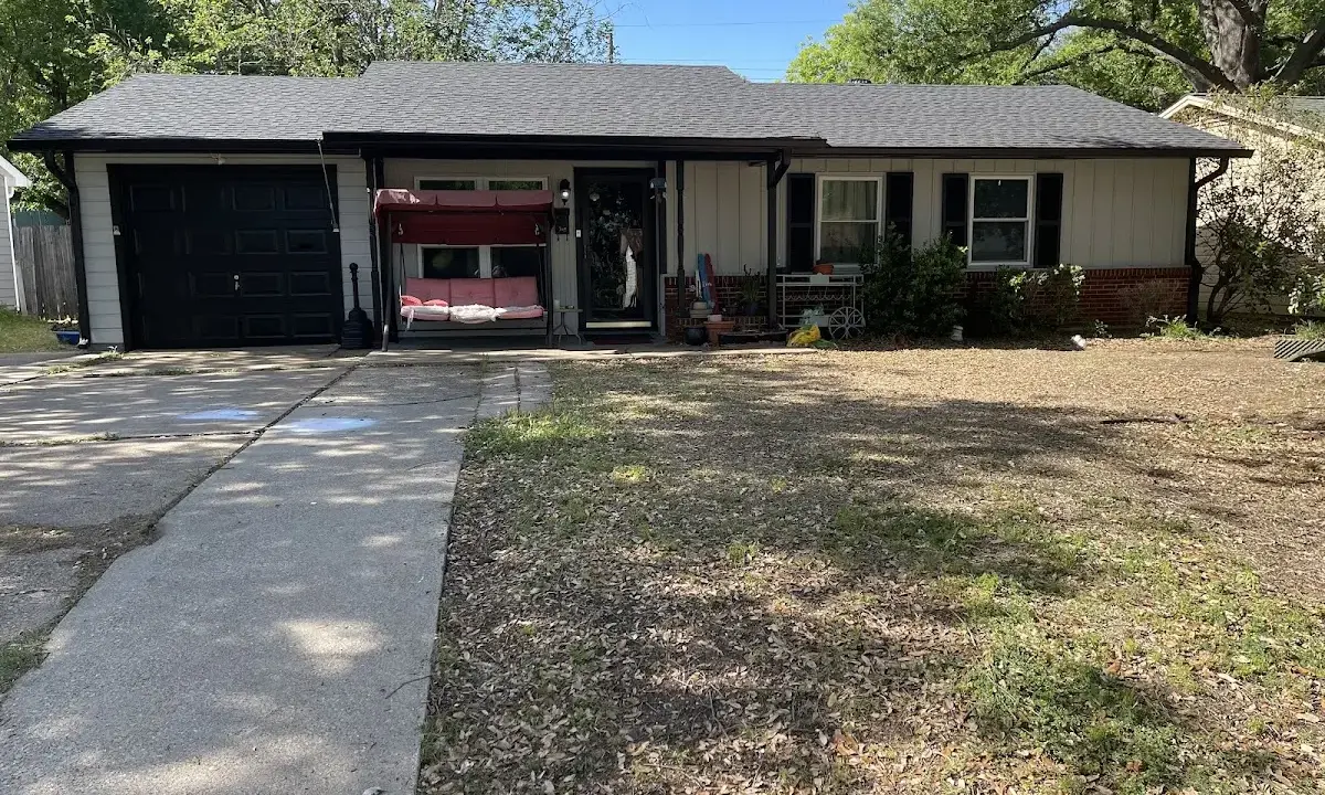 Hail Damage Roof Repair crew at work on a residential roof in Giddings